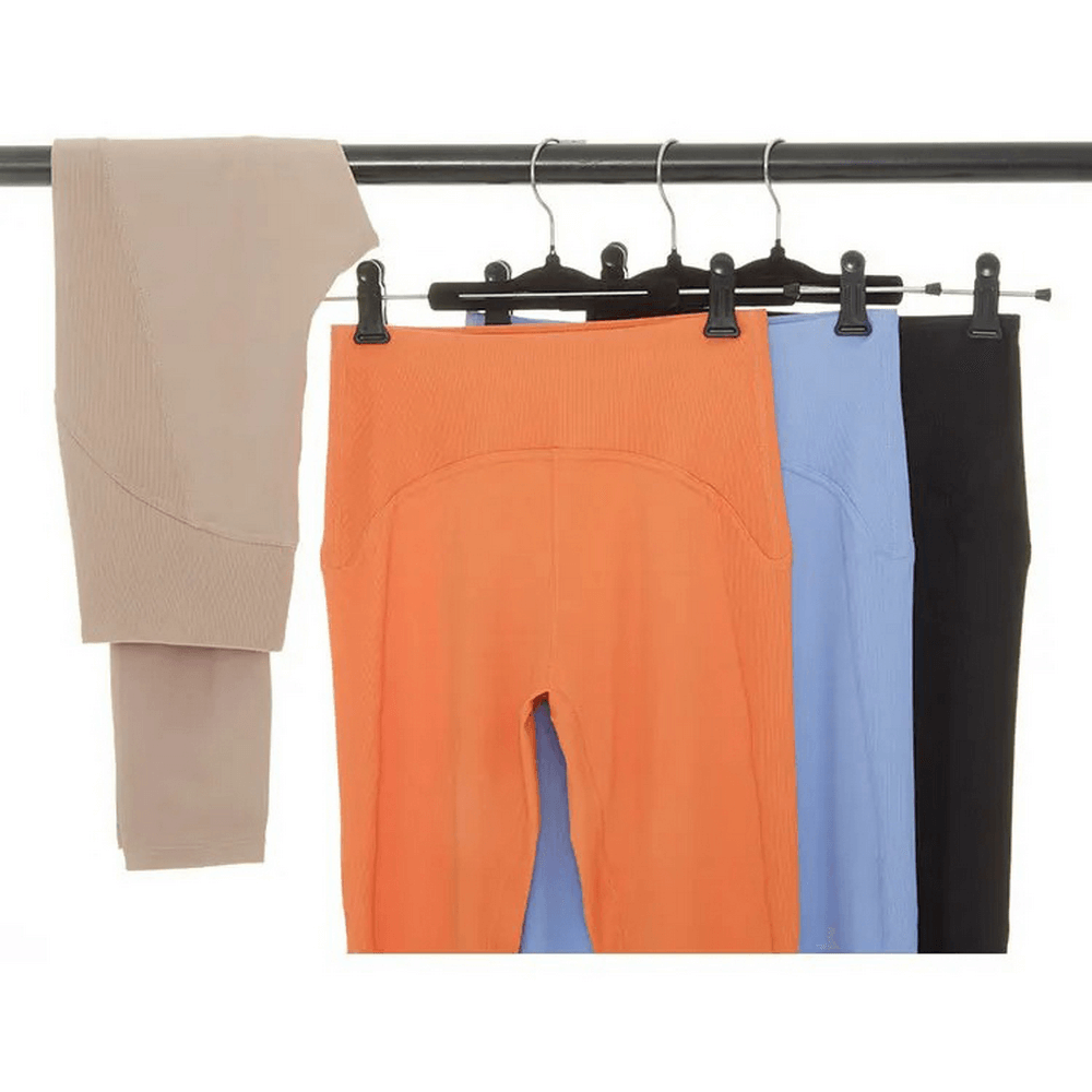 Women's versatile yoga leggings in beige, orange, blue, and black. Ideal for gym and dance sessions with a comfy nylon-spandex blend.